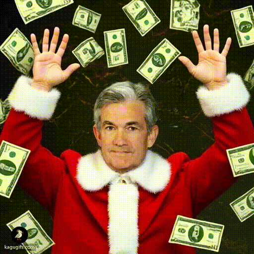 Jerome Powell wearing a red Santa costume with white fur trim, gray hair, composed expression, arms raised in delight as dollar bills cascade down around him in a swirling motion.