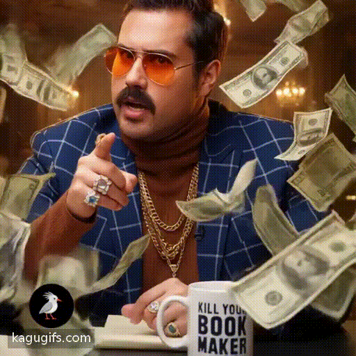 A confident man with a thick mustache wearing orange-tinted aviator sunglasses, a navy blue checkered blazer over a brown turtleneck, and gold chain necklaces with rings, gesturing expressively while being showered in falling dollar bills swirling around him.