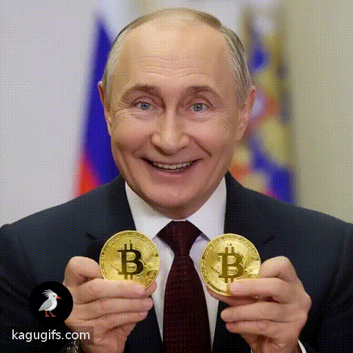 Vladimir Putin in a dark navy suit with burgundy patterned tie and white dress shirt, displaying a warm smile as he holds up gleaming golden bitcoin coins in his hands, his blue eyes engaged and expression animated with enthusiasm.