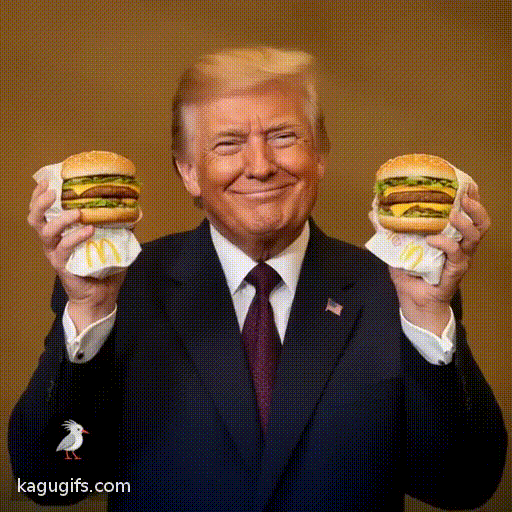 Donald Trump with big Macs in both hands, wearing a dark navy suit with a burgundy tie, signature blonde hair swept back, confident expression, proudly raising the burgers with enthusiastic arm movements, distinctive build and gesture.